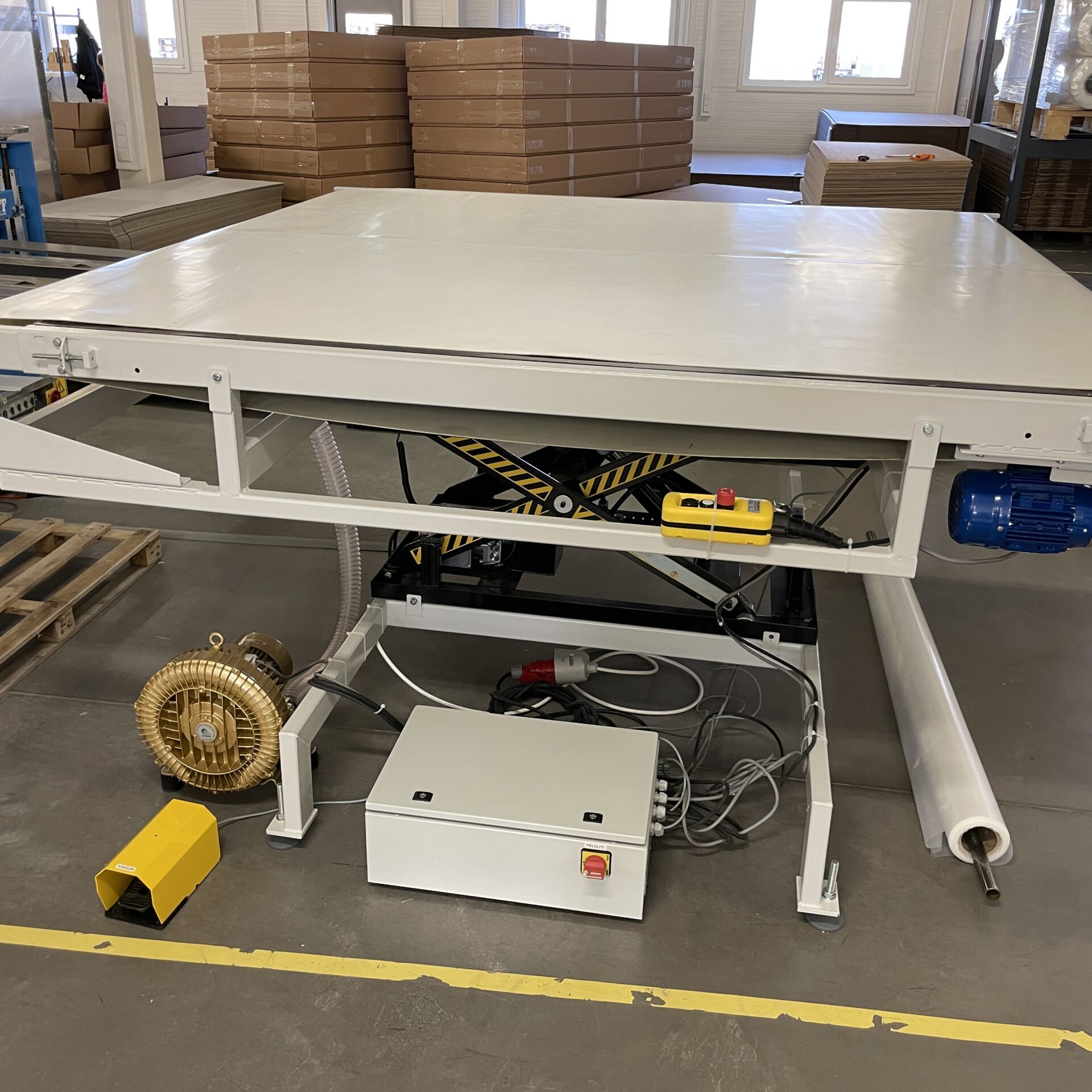 Height adjusted conveyor with vacuum gripper